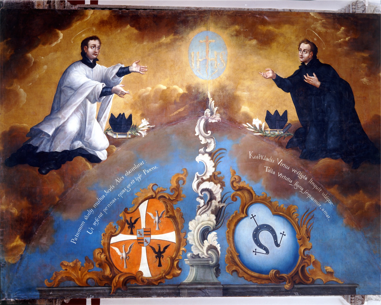 San Luis Gonzaga y San Estanislao de Kostka  adorando el monograma de Jesús