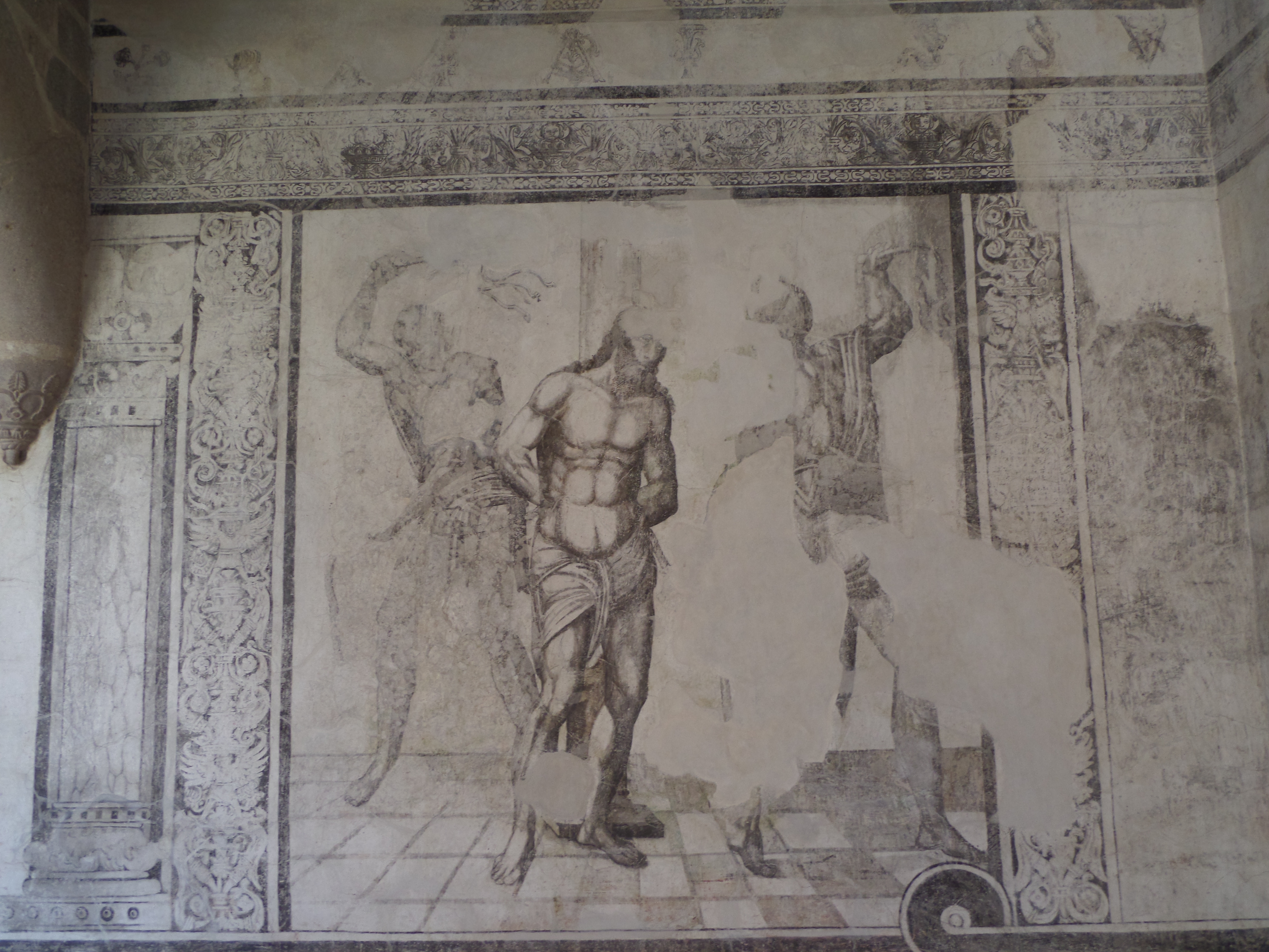 Detalle del mural 7 en la planta alta del claustro menor